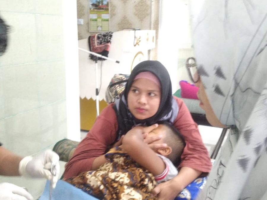 Kapolsek Koto Tangah Bantu Khitan Warga Kurang Mampu Bekerjasama dengan Relawan Khitan
