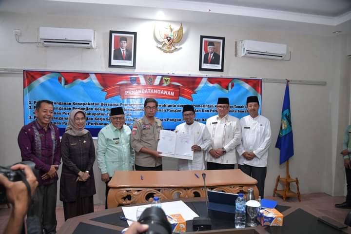 Pemko Sawahlunto & Pemkab Tanah Datar Tandatangani Kerjasama Pemasaran Komoditi Pangan & Perikanan