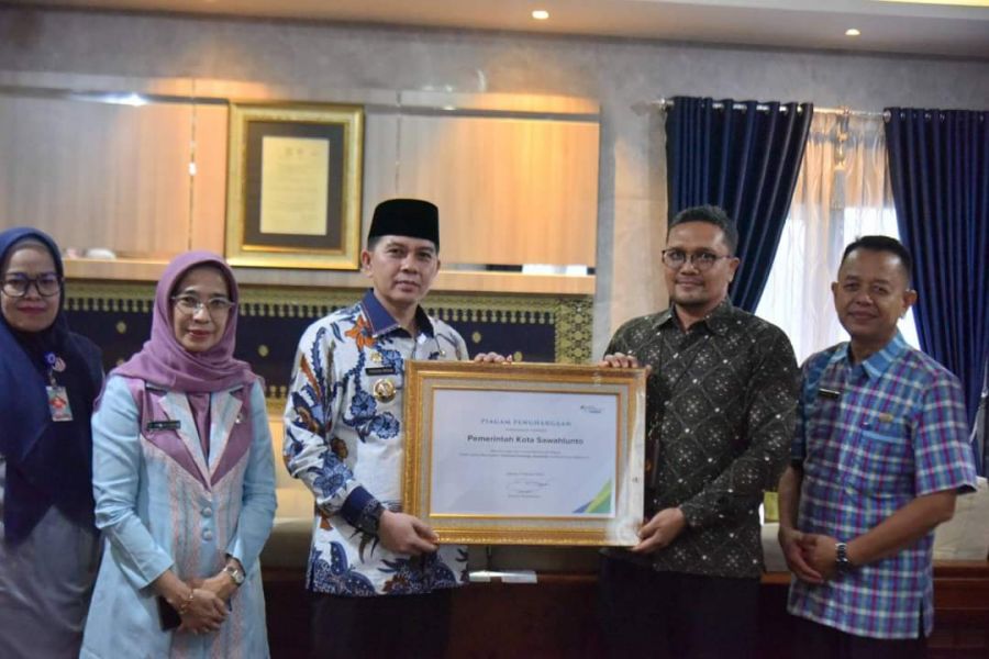 Pj Wako Sawahlunto Tandatangani Kerjasama dengan BPJS Ketenagakerjaan terkait JKK dan JKM